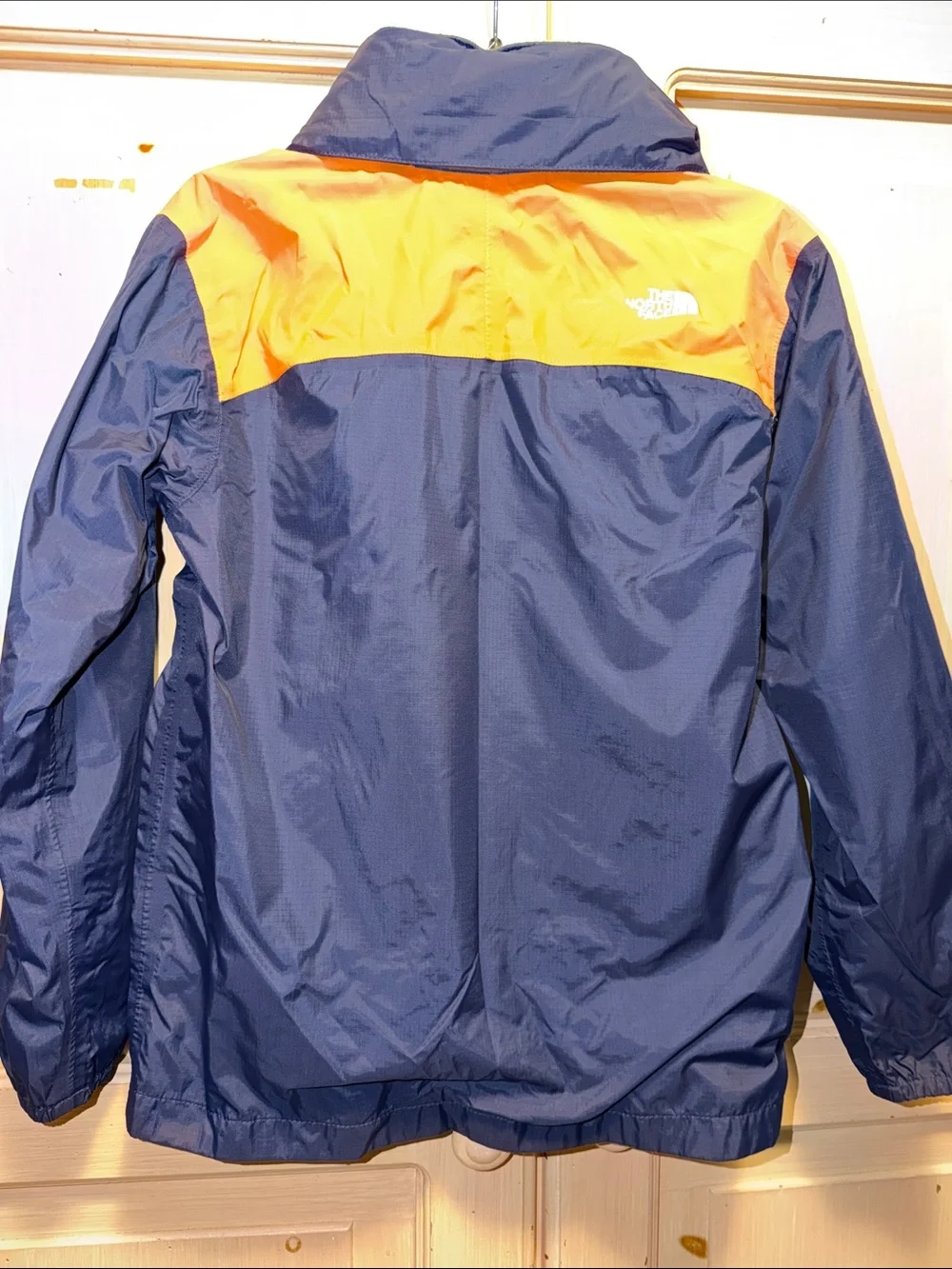 The North Face Kids Navy Blue and Orange Raincoat